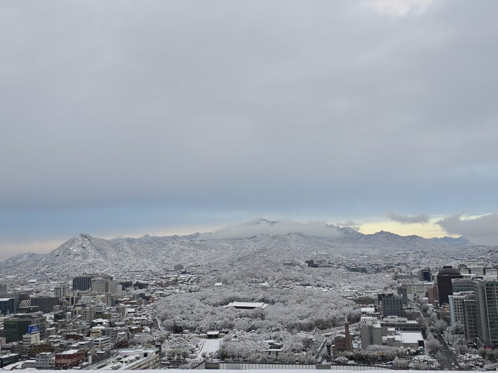 Bukhansan Mountain and Jongmyo Shrine Covered in the First Snow